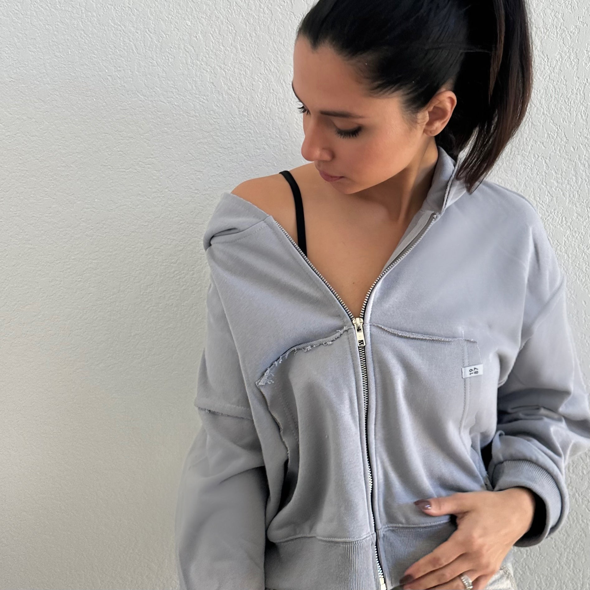 RUFFLE ZIP IN “CHARCOAL”