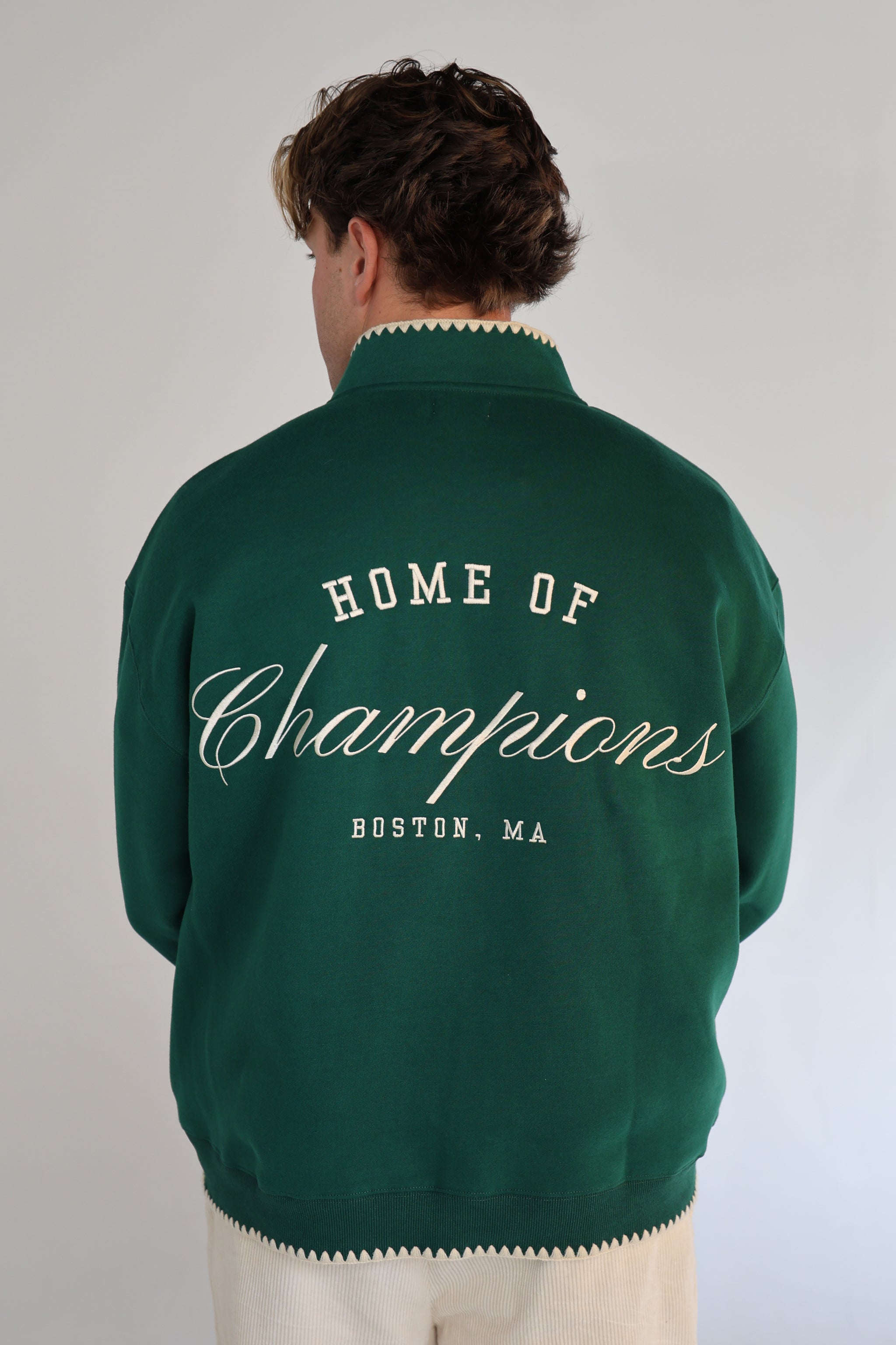 CHAMPIONS QUARTER ZIP IN 