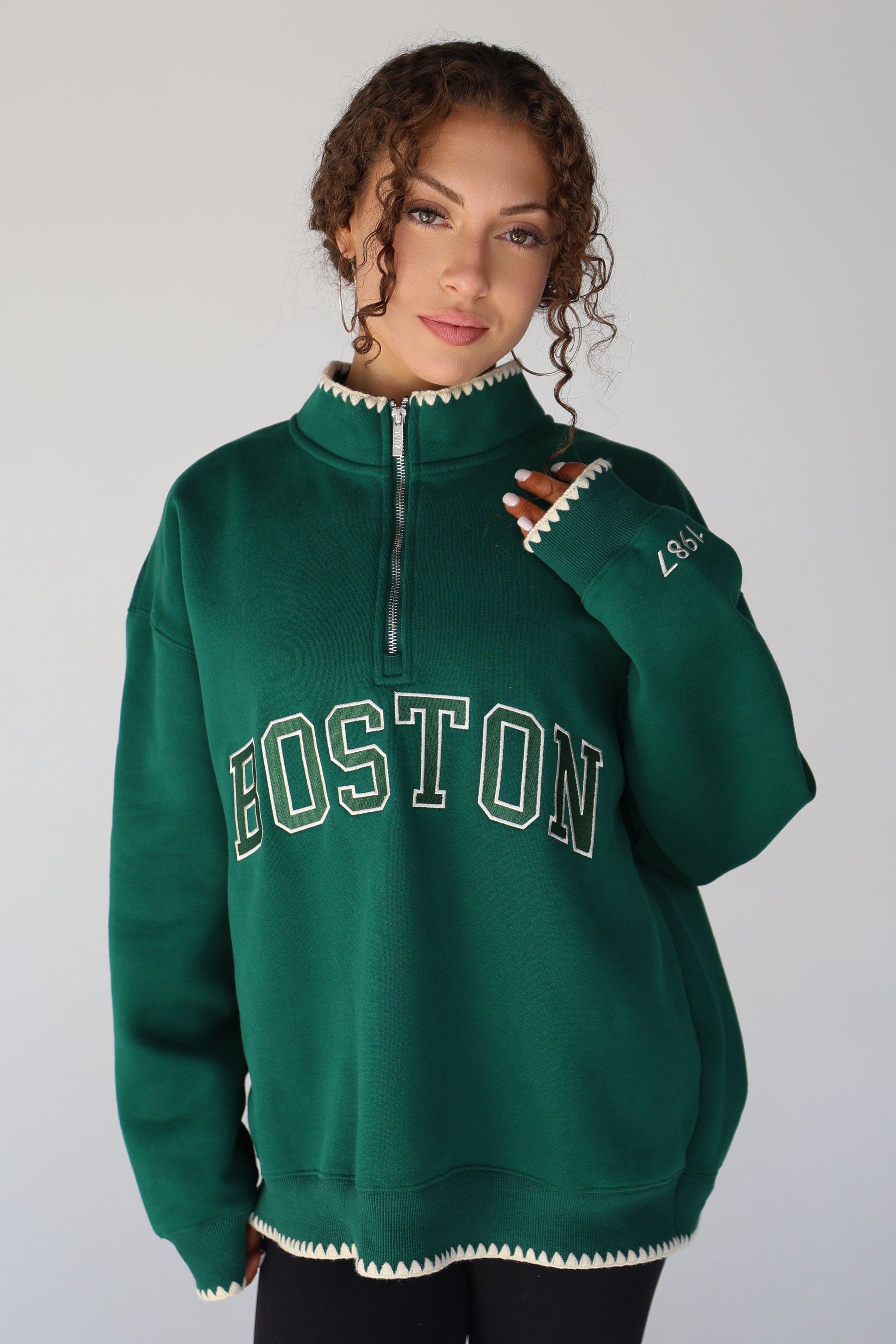 CHAMPIONS QUARTER ZIP IN 