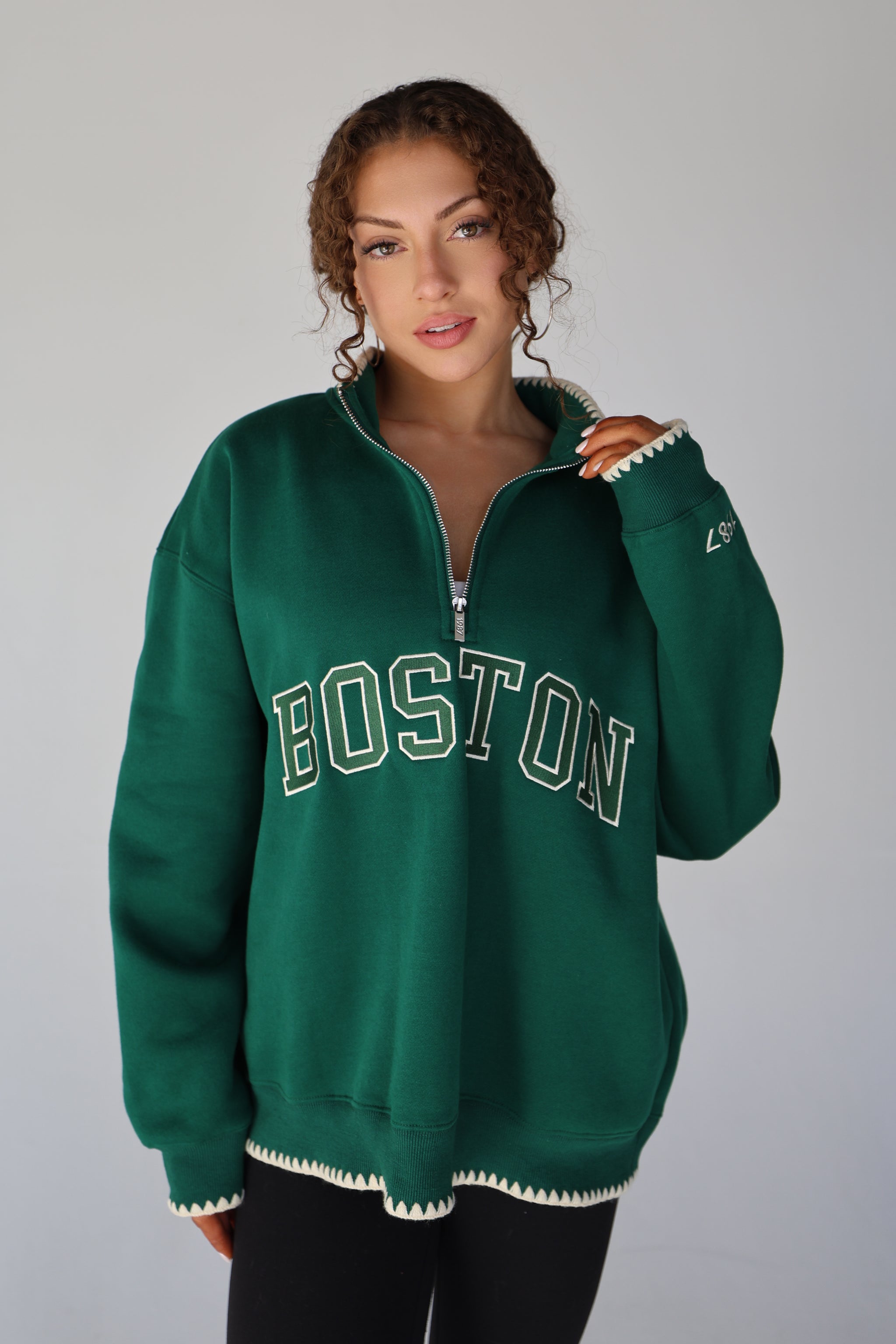 CHAMPIONS QUARTER ZIP IN 