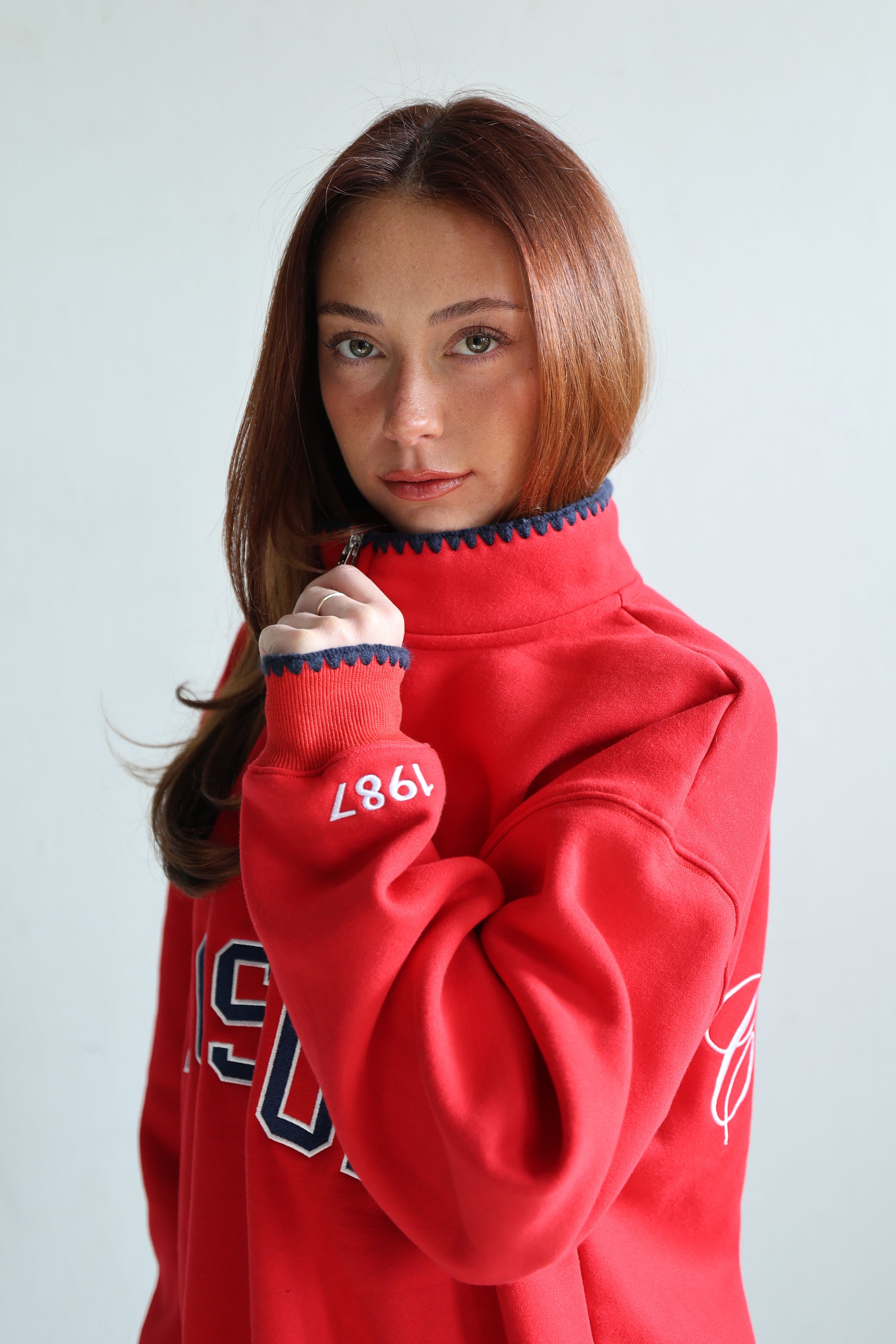 CHAMPIONS QUARTER ZIP IN 